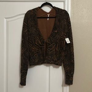 NWT Free people She’s All That Cardi” in Brown and Black animal print